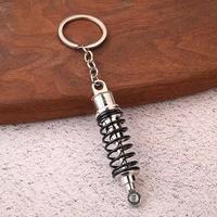Mode Vintage Turbo Keychain Suspension en alliage de zinc en métal avec amortisseur imprimé UV pour les amateurs de voiture Mooding