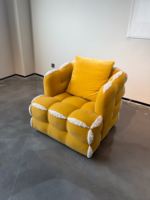Canapé individuel en forme de nuage jaune vif, garniture moelleuse qui vous enveloppe doucement pour profiter d'un temps de loisirs confortable à la maison