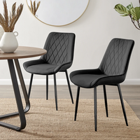Chaises de salle à manger élégantes et robustes avec dossier incurvé rembourré et structure métallique OEM
