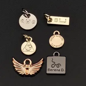 Groothandel Gegraveerde Merk Sieraden Tags Met Logo Custom Custom Metalen Tags Charme Hanger Voor Sieraden