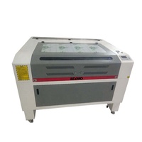 Machine de gravure laser CO2 à bon prix pour verre miroir 6090 Machine de découpe laser CO2 100W pour tissu acrylique