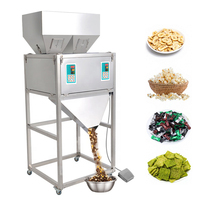 Machine de remplissage et de conditionnement haute vitesse 2 têtes pour 1 kg de snacks, grains de café, riz, biscuits, sachets, pochettes et assaisonnements