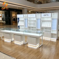 Présentoir optique en gros pour magasin, comptoir de vente de lunettes pour centre commercial avec panneau logo de marque