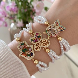 Pulsera Ajustable TK-B586 con Cuentas de Perlas Maravillosas, Dijes de Circonita Arcoíris, Mano de Hamsa Dorada, Búho y Mariposa, Estilo Vintage - Product Image 3