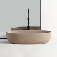 Lavabo ovale en céramique de qualité hôtelière OEM/ODM, effet granit, pour salle de bain de luxe, hôtel, villa