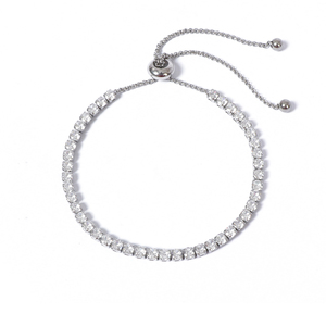 Pulsera de tenis chapada en rodio con circonitas redondas engastadas en canal, joyería clásica unisex para bodas - Product Image 1