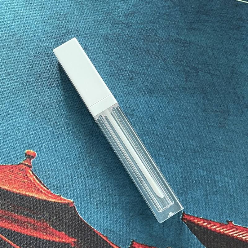 clear tube with shiny white top