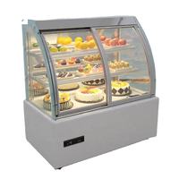 Vitrine réfrigérée pour gâteaux en acier inoxydable électrique avec porte coulissante en verre incurvée pour les hôtels