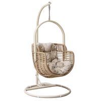Fauteuil suspendu en rotin moderne avec coussin moelleux et cadre en aluminium, hamac suspendu en forme d'œuf avec support pour une utilisation en extérieur et en intérieur