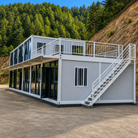 Maison préfabriquée modulaire détachable en conteneur, structure en acier, avec mur-rideau en verre de luxe à deux étages pour bureau