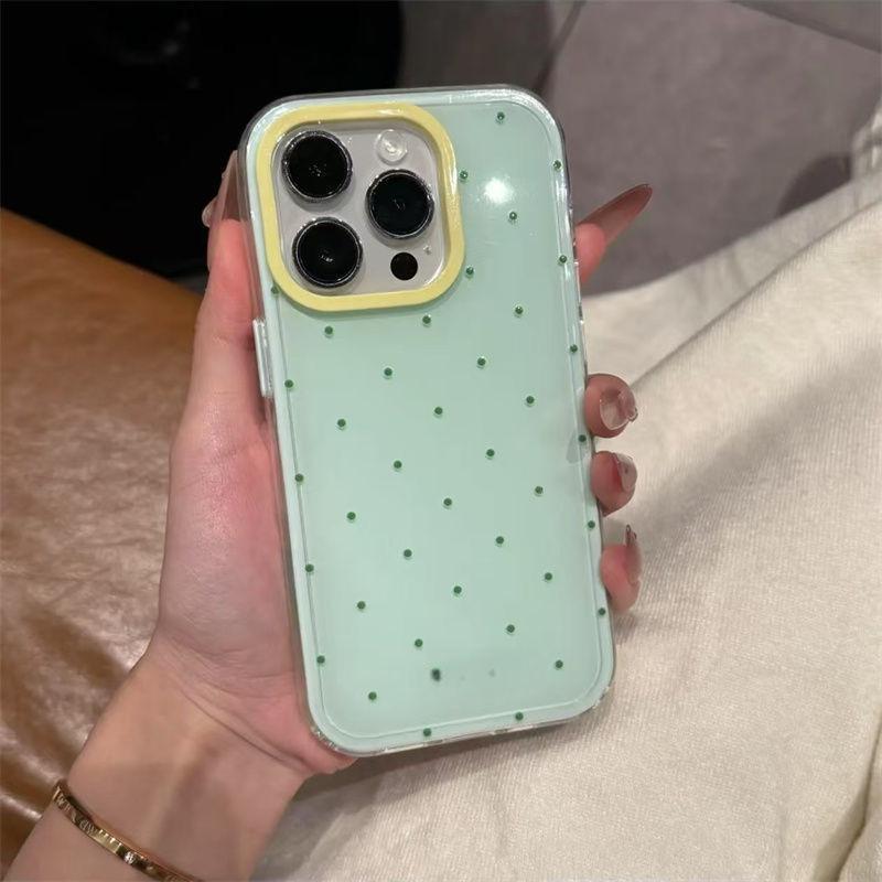 Korean-style red polka dots on mint green background