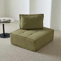 Canapé individuel cube minimaliste, unité d'assise modulable, fauteuil lounge moderne pour appartement et coin détente