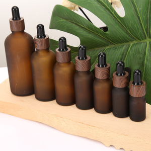 5ml 10ml 15ml 20ml 30ml 50ml <strong>Glass</strong> Frosted <strong>Amber</strong> Essential Oil Eye Liquid <strong>Bottle</strong> with Dark Brown Wood Grain Dropper Cap - Product Image 3