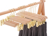 Cintre en bois personnalisé Oem et ODM, logo imprimé avec rose doré