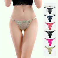 Tanga de encaje antibacteriano de talle bajo sin costuras para mujer con patrón floral bordado de nailon y elastano