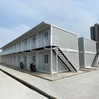 Maison conteneur préfabriquée moderne, durable, imperméable, à 2 étages, démontable, en kit, pour hôpital, abri, camp de réfugiés, salle de classe