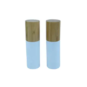 hot sale refillable 50ml matte white glass bottles empty cosmetic glass cream bottle with bamboo pump