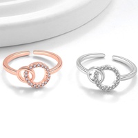 Meilleure vente transfrontalière : Bague double en cuivre électroplaqué, design entrelacé, style européen minimaliste et tendance pour femme