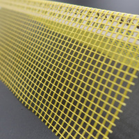 Perle d'angle pour mur de plâtrage avec maille en fibre de verre