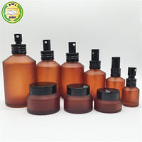 Flacon compte-gouttes en verre ambré mat noir transparent à épaule inclinée pour sérum cosmétique et huile essentielle, ensemble d'emballage avec boîte