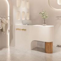 Kainice Mobilier de bureau moderne personnalisé Bureau de réception en bois courbé Comptoir de vente au détail pour magasins Comptoirs de caisse