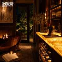 Meuble à vin de style hôtel de luxe avec comptoir en onyx rétroéclairé et rangement pour bar à sec, idéal pour suite parentale et salon