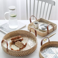 Plateaux décoratifs tissés OEM pour table basse, paniers de rangement naturels en rotin, plateaux de service ronds avec poignées