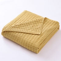 Vente en gros de mousseline teintée en douceur couleur unie moderne 100% coton gaufré couverture bébé canapé couverture serviette couverture