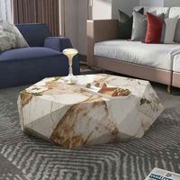 Table basse italienne minimaliste haut de gamme en forme de roche, taille salon moderne et simple en forme de lumière
