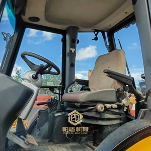 รถขุดตักล้อยาง JCB 3CX สีเหลือง ระบบบังคับเลี้ยวสี่ล้อ พร้อมบุ้งกี๋และที่ตักด้านหน้า - Product Image 6