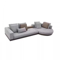 Canapé d'angle incurvé en L de luxe italien pour salon, style Mid-Century, en tissu et éponge, pour hôtel, OEM ODM