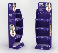 Support d'exposition pour gants Ray Custom Glove, support en carton avec crochets pour suspendre les gants en magasin.