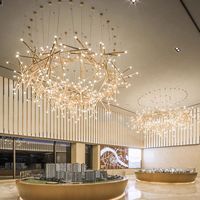 Lustre LED rond en fer personnalisé avec un angle de faisceau de 360° et une installation facile pour les bureaux de vente, les hôtels, les salles de banquet
