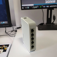 Gran oferta, usado conmutador de red de 10/100Mbps con 2 puertos y 5 puertos de 1/2 Mbps con SNMP QoS para aplicaciones de barra de Internet y cámara IP