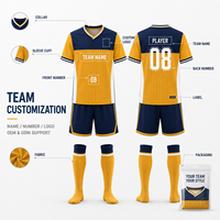Tenue de football personnalisée pour jeunes : Maillot à manches courtes et short à rayures verticales et blocs de couleur pour l'entraînement quotidien des équipes de football pour enfants