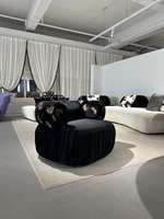 Fauteuil d'appoint créatif en tissu bouclé de l'usine de Foshan, fauteuil individuel rembourré pour salon et projets hôteliers