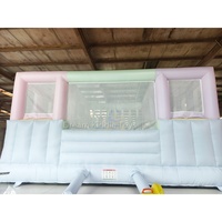 Château gonflable commercial en PVC pastel pour enfants, château sauteur macaron avec toboggan intégré pour location événementielle
