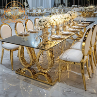 Tables à manger modernes de style indien avec plateau en verre et base en acier inoxydable sculpté, pour les salles de réception, les mariages, les hôtels, de bonne qualité