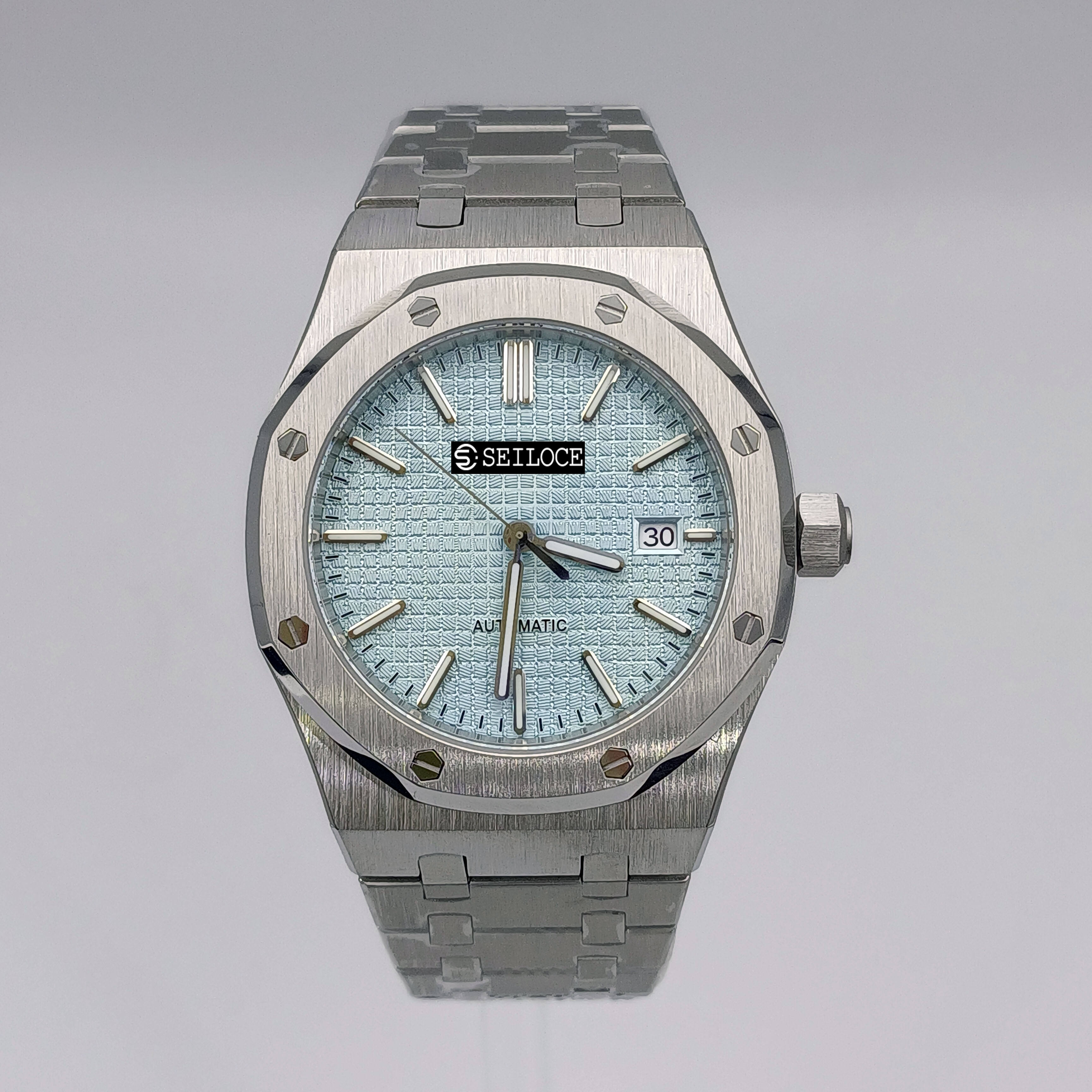 ตัวเรือนสีเงิน+หน้าปัดสีฟ้าอ่อน