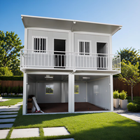 Garage moderne européen à deux étages en conteneurs avec entrepôt de stockage, bureau préfabriqué modulaire, villa