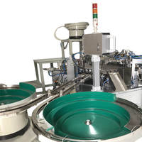 Machine d'assemblage automatique de valves d'aérosol pour pulvérisateurs automatiques, destinée aux pompes/buses dans les industries cosmétiques et de nettoyage