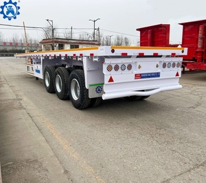 รถพ่วงพื้นเรียบ 3 เพลา ขนาด 20 ฟุต 40 ฟุต 45 ฟุต 53 ฟุต สำหรับขนส่งตู้คอนเทนเนอร์ รถพ่วงกึ่งพ่วงพื้นเรียบสำหรับขาย - Product Image 3
