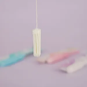 Tampon digital jetable de haute qualité pour femmes, toutes tailles, pour soins féminins