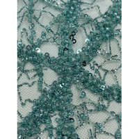 Nouvel arrivage de tissu de dentelle verte de luxe avec de lourdes paillettes de perles de broderie pour les robes de robe de mariée Designer de paillettes de perles pour B