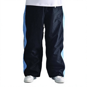 Pantalon de ski noir super moderne 2026 avec ouvertures latérales cachées à fermeture éclair bleue, taille à cordon de serrage, braguette avant, passants de ceinture et aérations - Product Image 1