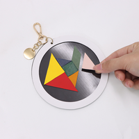 Nouveauté : Jeu de puzzle magnétique portable en cuir PU pour enfants, porte-clés pour les voyages