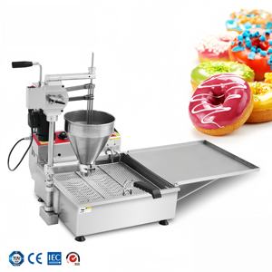 Nouvelle machine à faire des boules de beignets et des trous pour la boulangerie, haute productivité, production automatique avec des noix, des fruits et du lait - Product Image 1