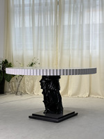 Table à manger ronde blanche contemporaine avec base sculpturale noire, table de salle à manger design, meubles d'art