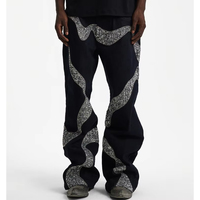 Jean en denim noir pour homme, coupe large, style streetwear, avec patchwork ondulé à sequins argentés, coupe droite et ample