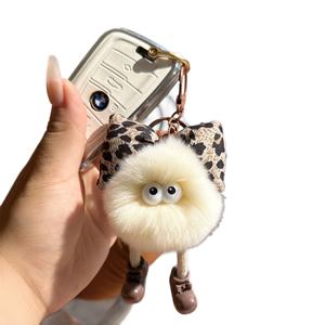 En gros Nouveau Pendentif de sac à dos en peluche doux à imprimé léopard, forme 3D avec nœud et pompon, accessoire de sac DIY, breloque de sac à main, mousqueton - Product Image 4